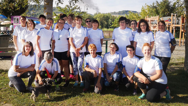 A group photo for a breast cancer run/walk